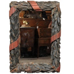 French 1870s Large Black Forest Wood Carved Mirror with Painted Tied Leaves