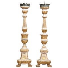 Pair of Continental Painted and Parcel-Gilt Candlesticks with Paw Feet