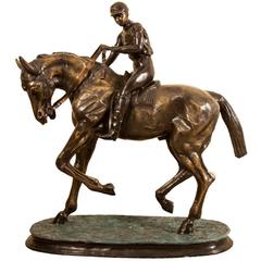 Grande sculpture en bronze de cheval et de jockey:: Mene