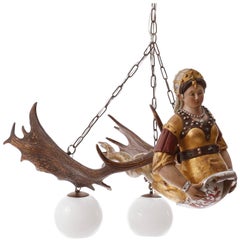 Antique Antler Chandelier with Carved Wood Figurine "Lusterweibchen"