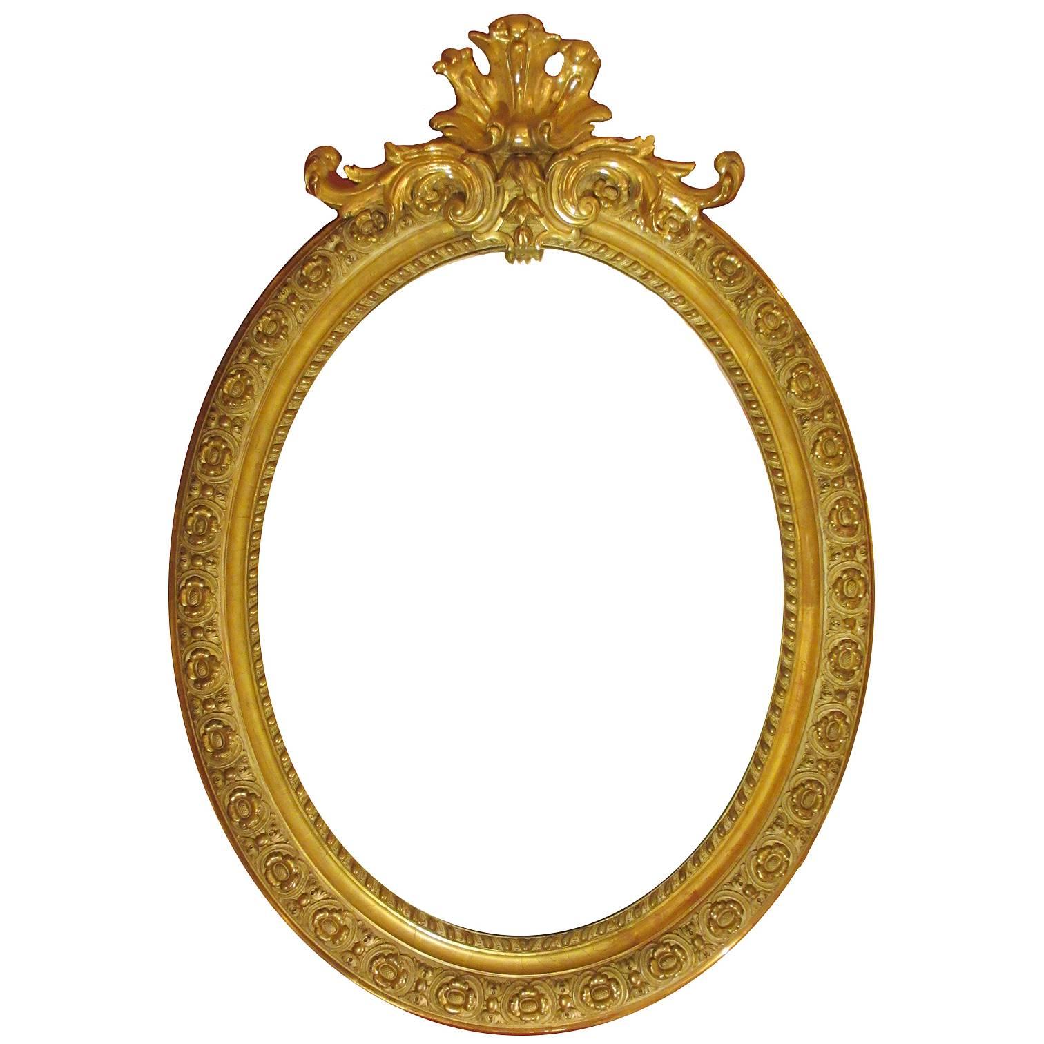 Cadre de miroir ovale de style Louis XVI du XIXe siècle en bois doré et gesso sculpté