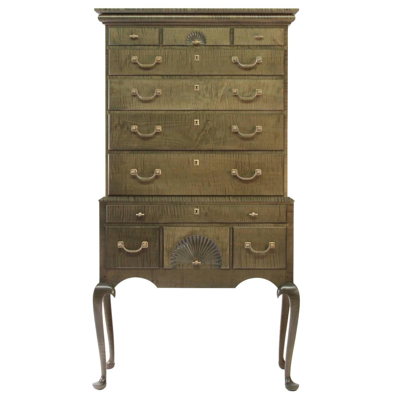 O&G Tiger Maple Highboy with Cast Bronze Fist or Hand Hardware For Sale