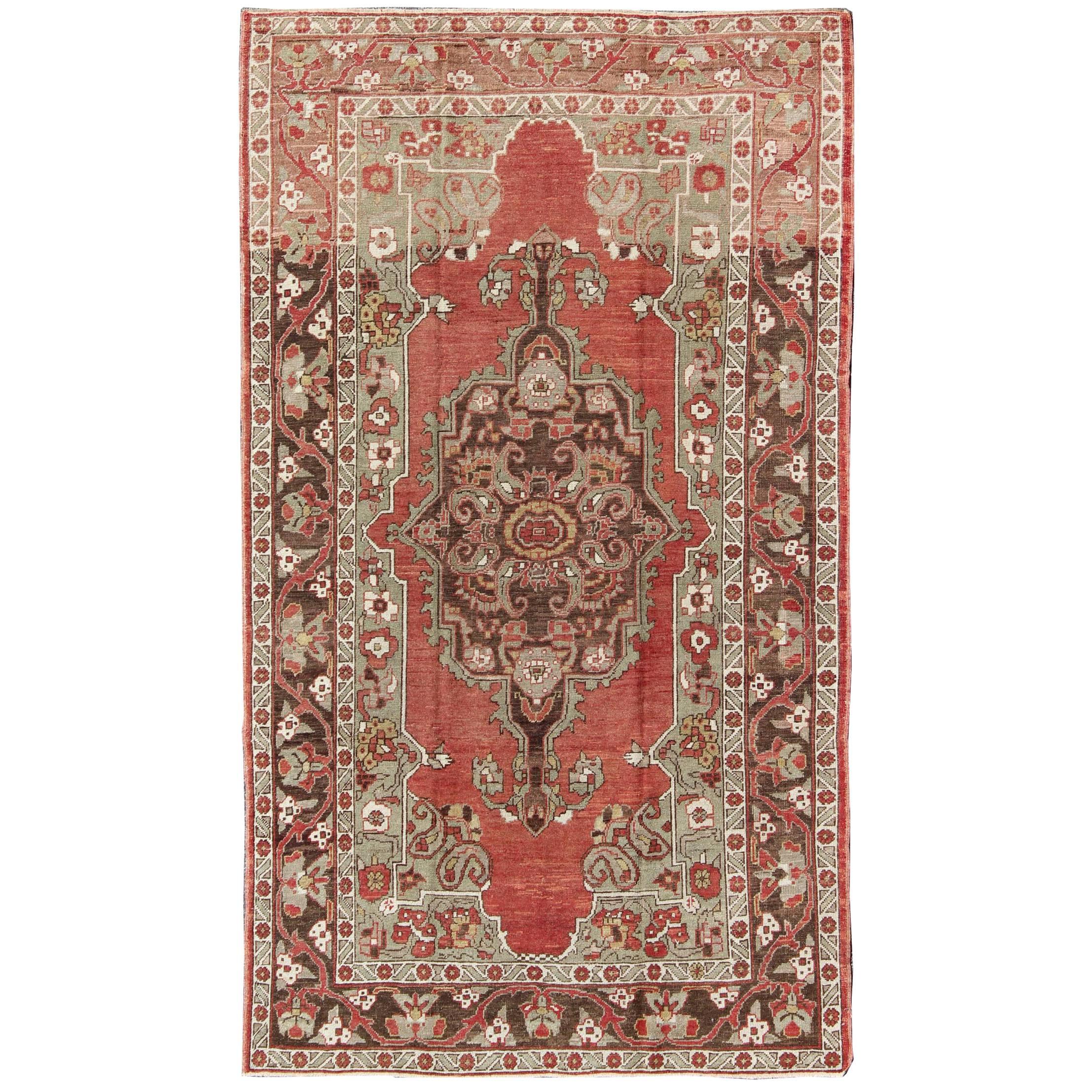 Antique Turkish Oushak Carpet with Medallion in Soft Red, Green and Brown