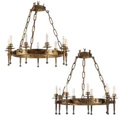 Pair of French Round Gilded Iron Nine-Light Chandeliers with Torch Shaped Arms