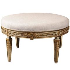 Antique Italian Neoclassical Style Upholstered Round Ottoman with Giltwood Motifs