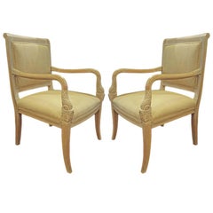 Pair of Armchairs with Carved Dolphin Head Hand Rests.