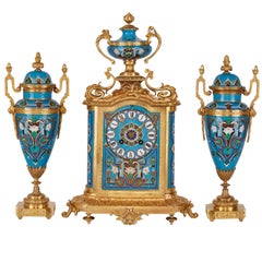 Ungewöhnliches Uhren-Set aus Goldbronze und Porzellan