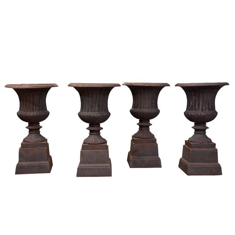 Set of Four Cast Iron Urns