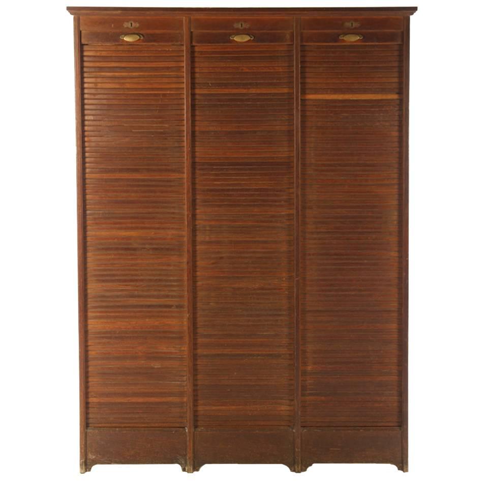 French Roll Top Cabinet, circa 1910 Having Three Vertical Tambour Doors