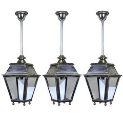 Three Silver Lanterns