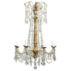 Italian Eight-Light Crystal and Giltwood Chandelier from the Early 20th Century