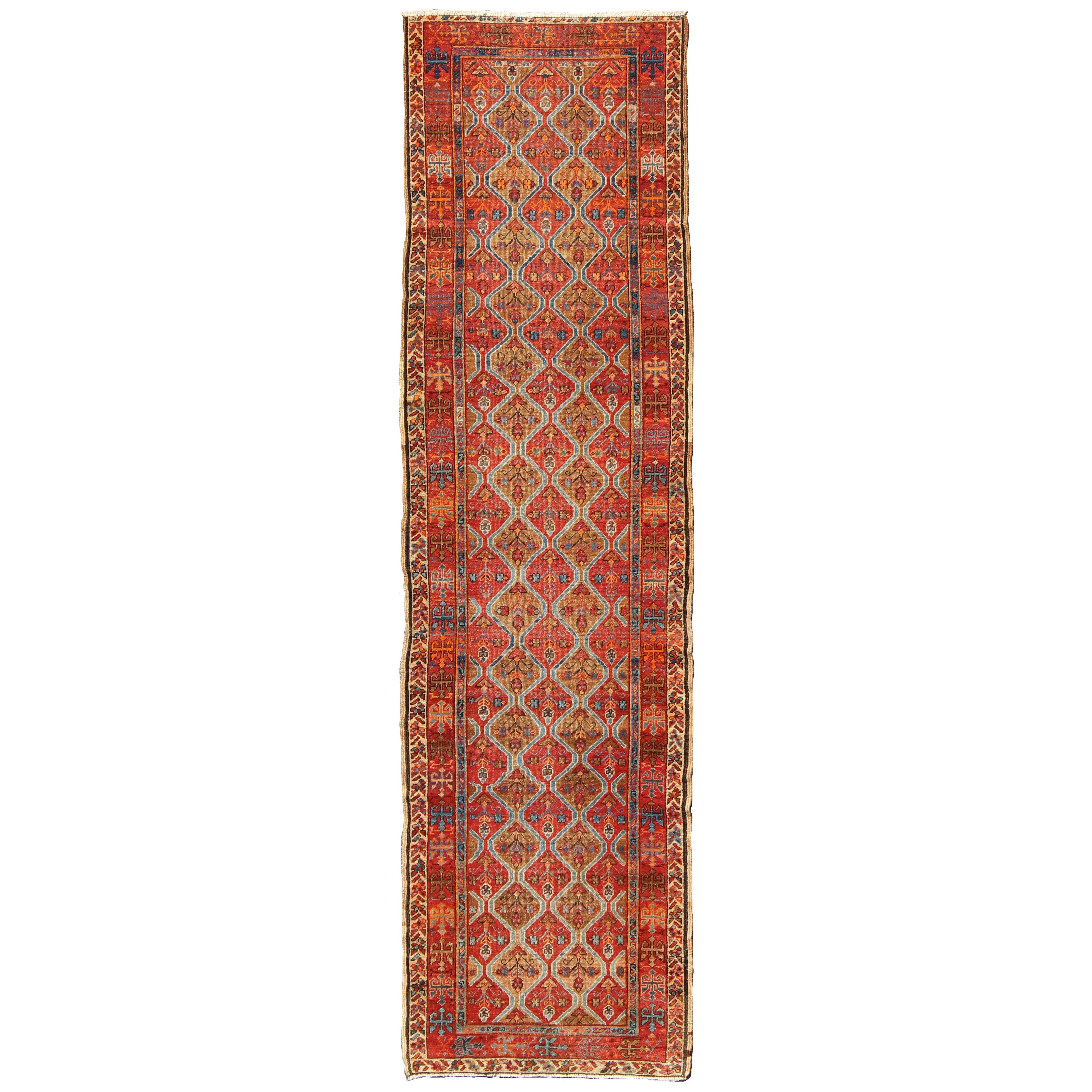 Antique Serapi Runner with All-Over, Multicolor Geometric Design For Sale