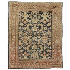 Tapis persan Sultanabad ancien et vieilli de style artisanal traditionnel