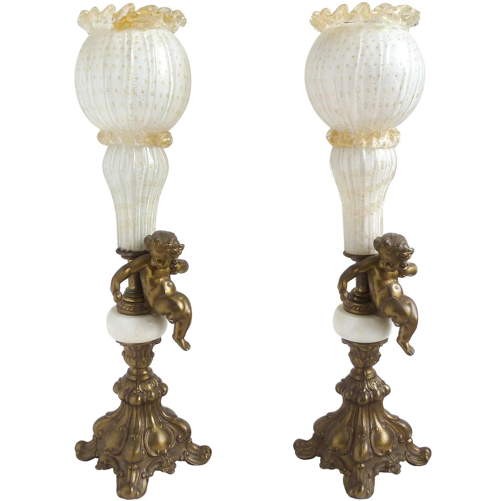 Murano White Gold Flecks Italian Art Glass, Marble, Brass Cherub Torch Lamps