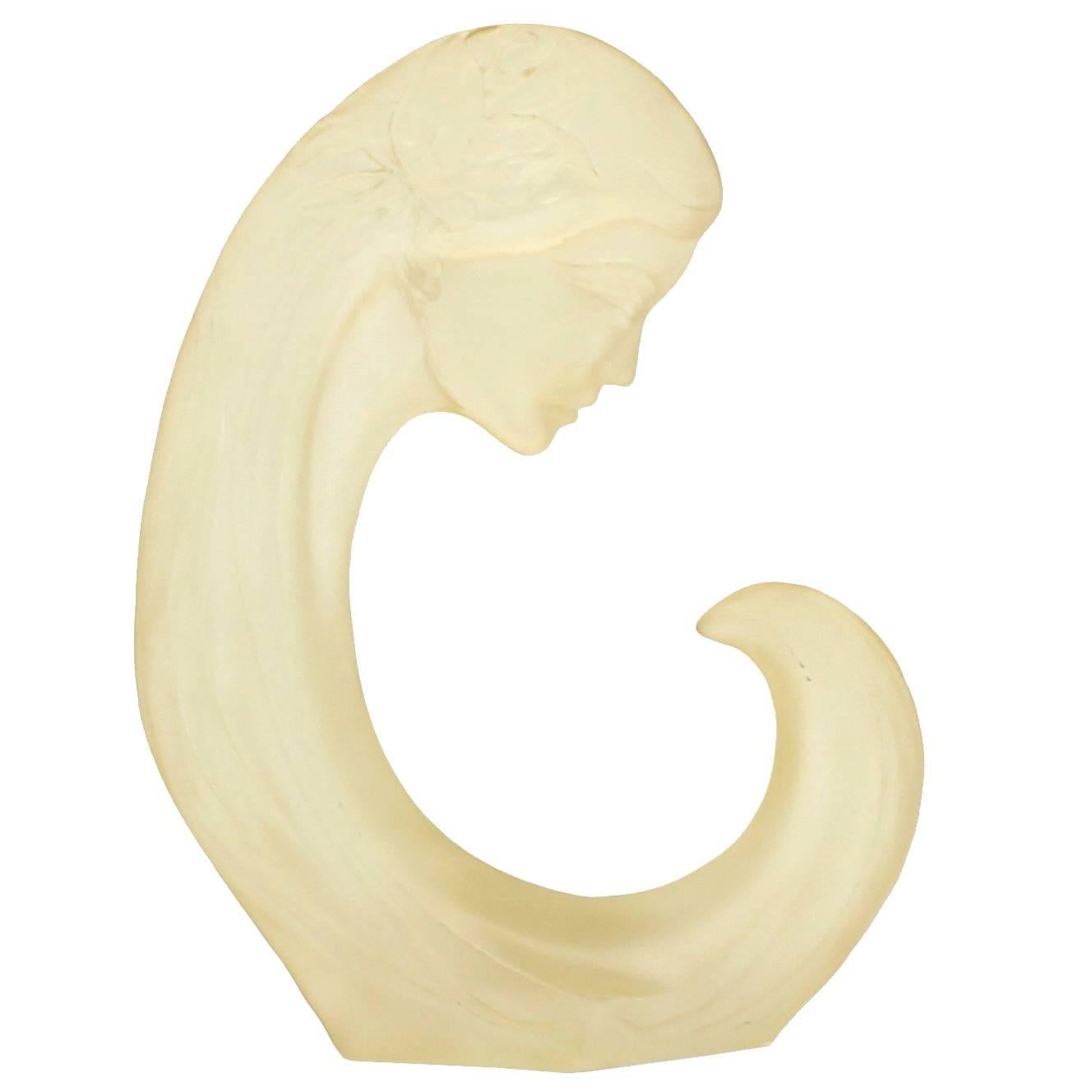 Carved Lucite Sculture of a Woman Face For Sale