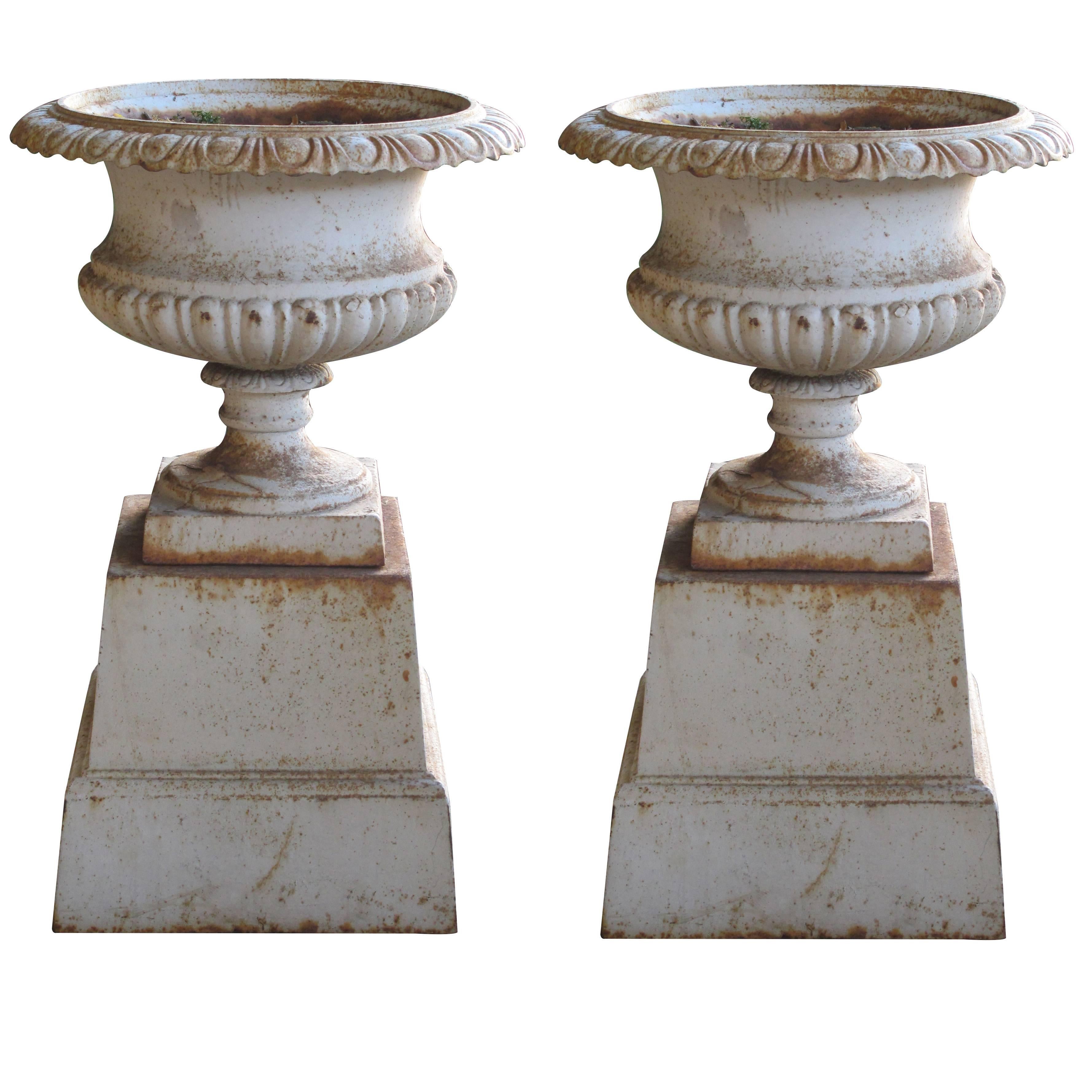 Handsome American Neoclassical Style Iron Painted Campagna Urns on Stands, pair