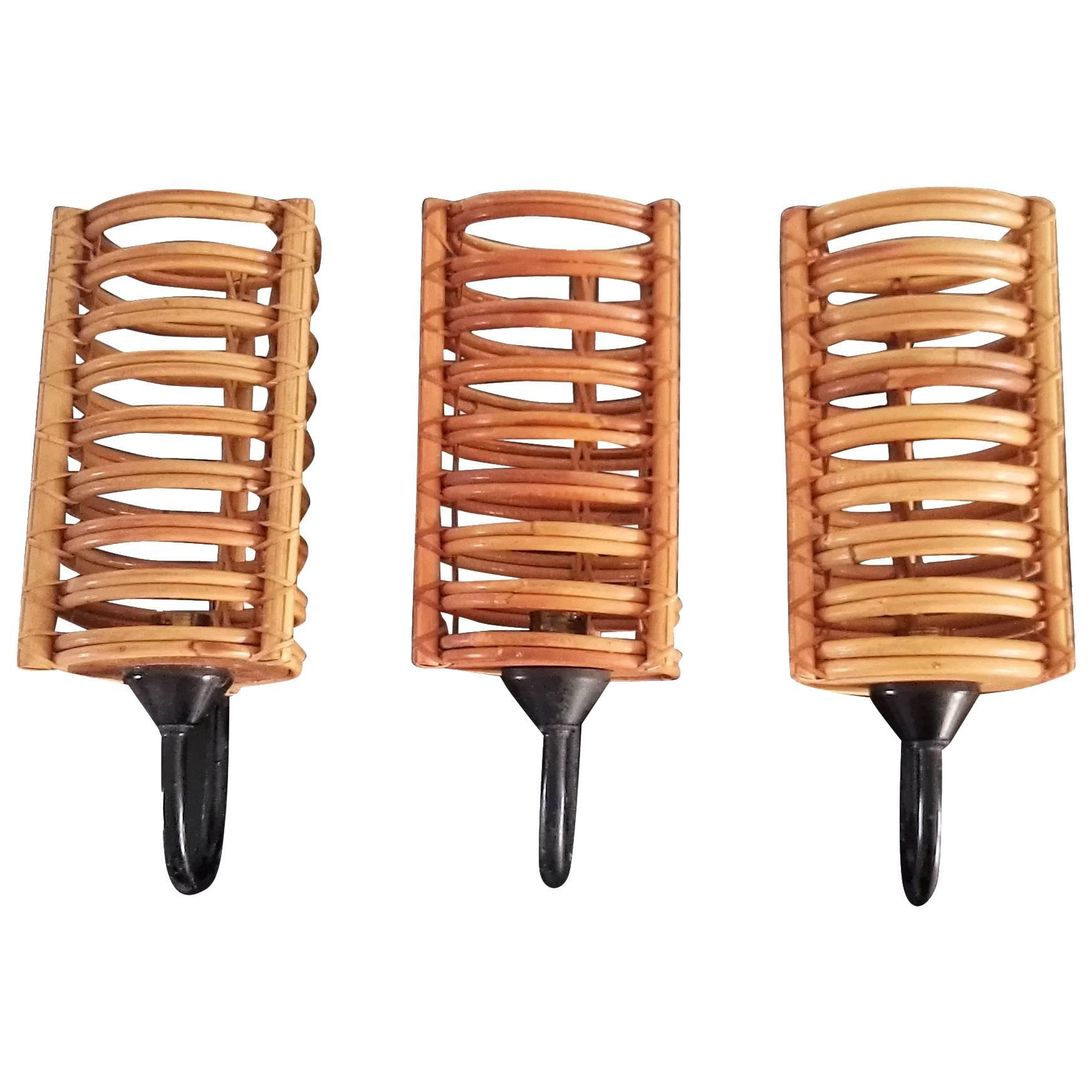 Set of Three Rattan and Lacquered Steel Sconces, France, 1950s