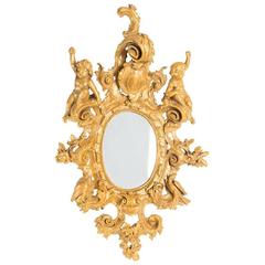 Oval Gilt Mirror with Putti Details