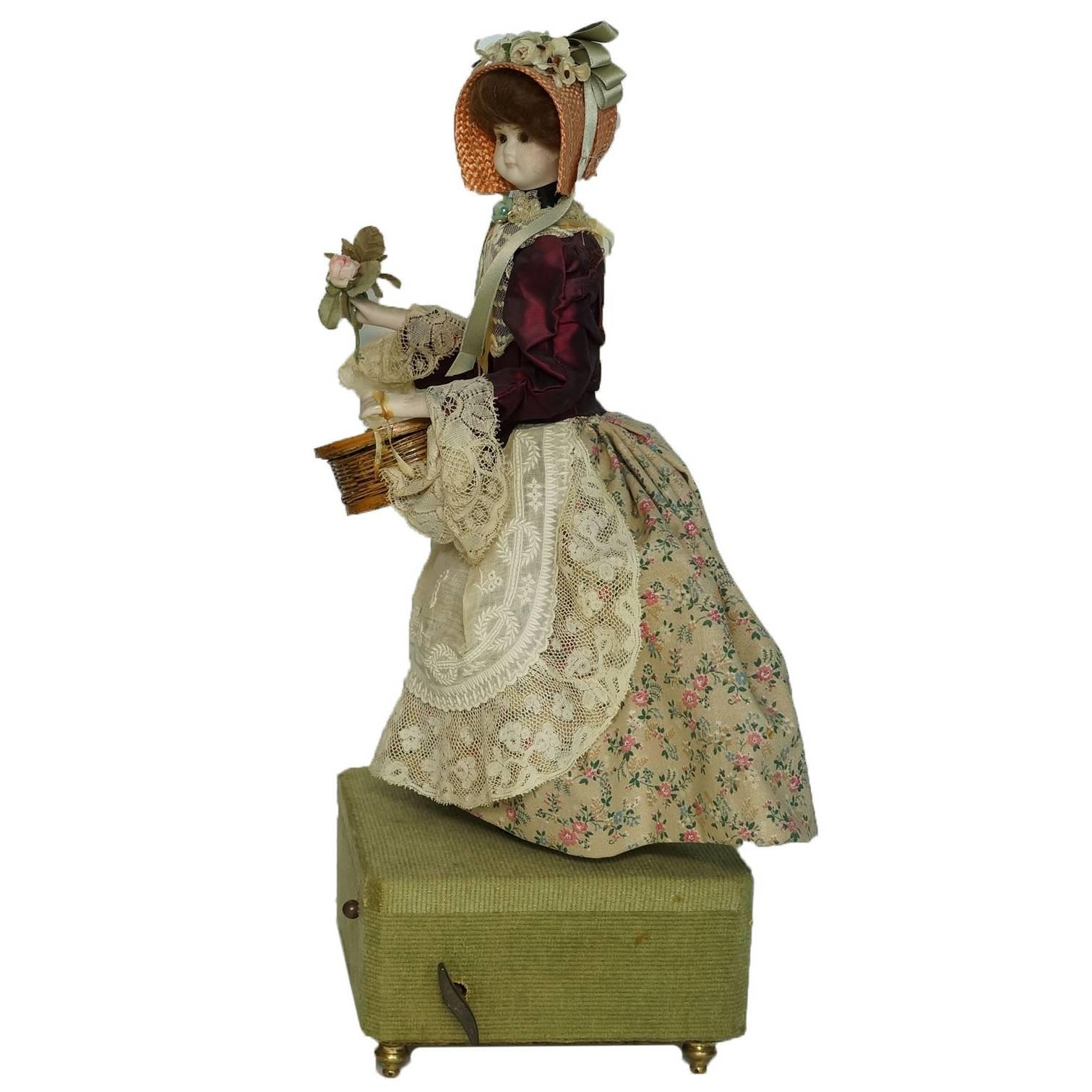 Automaton Figure of a Standing Girl Holding Flowers Playing Music