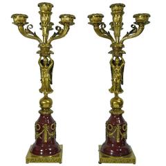 Pair of French Neoclassical Style Bronze and Porcelain Figural Candelabras
