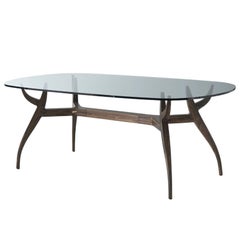 Stag - walnut dining table, designed by Nigel Coates