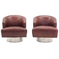 Pair of Milo Baughman Leather and Brushed Steel Swivel Barrel Lounge Chairs