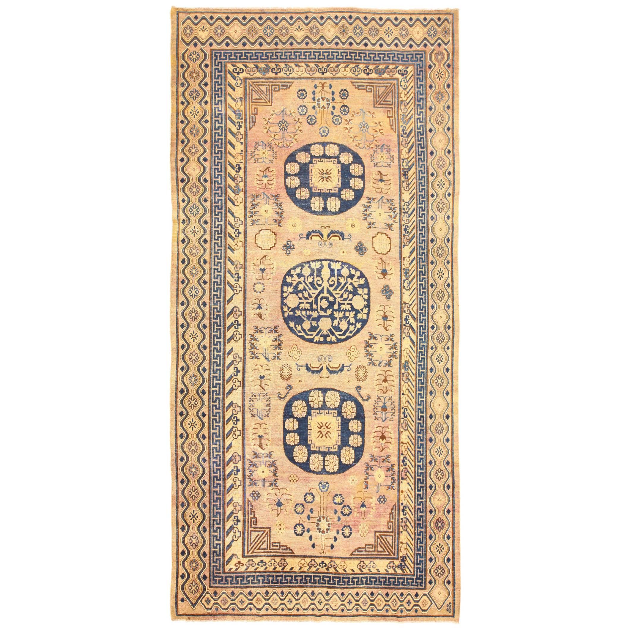 Antique Khotan Rug. Size: 6 ft 6 in x 13 ft 2 in  For Sale