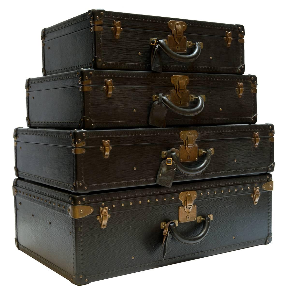 Vintage Louis Vuitton Black Epi Leather Four-Piece Luggage Set For Sale