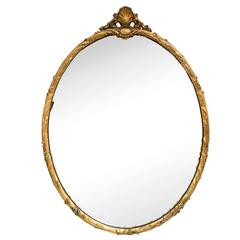 1950s Large Gilt Carved Shell Crest Oval Mirror by Friedman Brothers