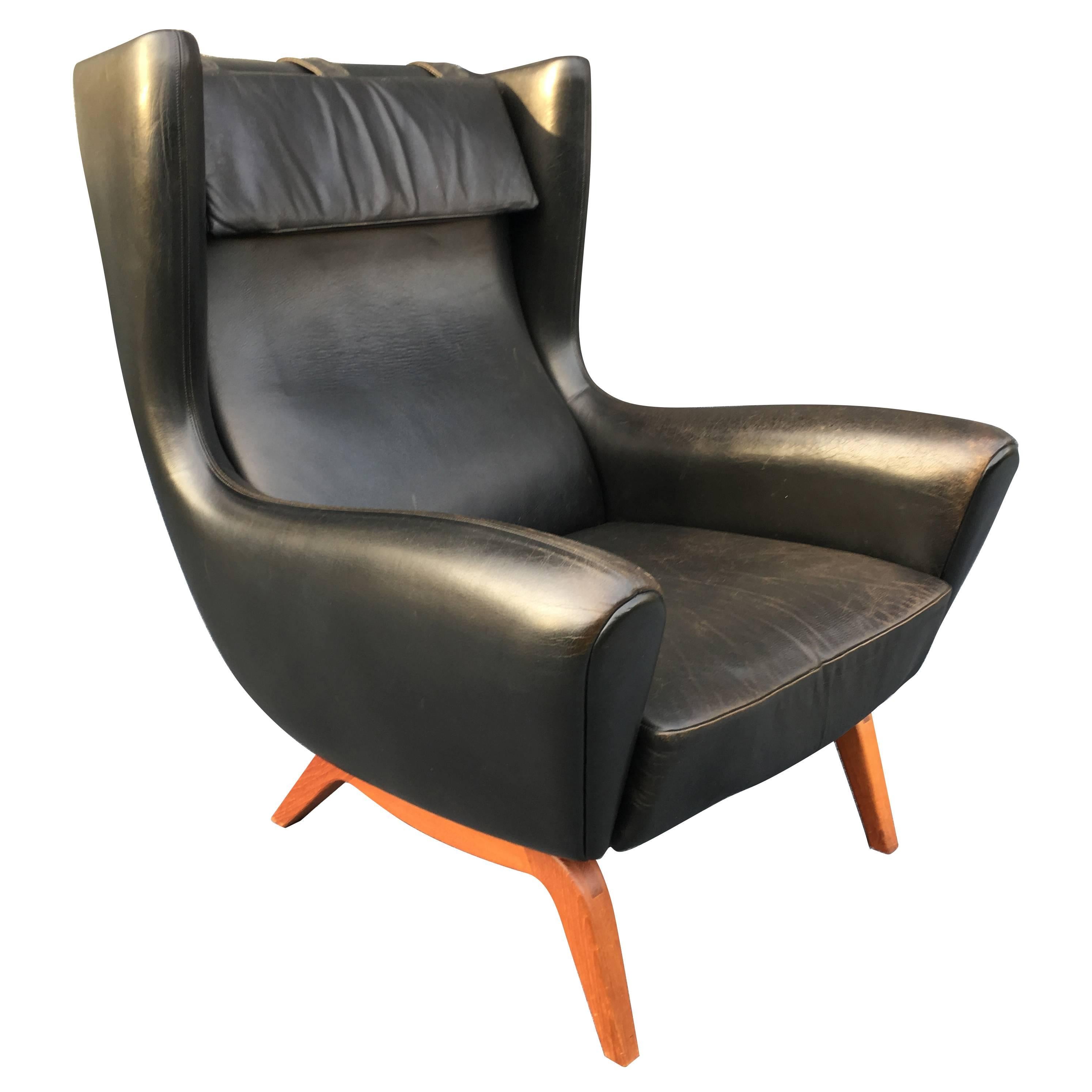 Illum Wikkelso Black Leather and Teak, Model 110 Lounge Chair