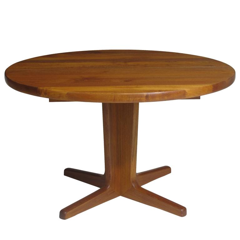 Solid Teak Dining Table with Two Leaves For Sale at 1stDibs
