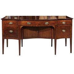Englisches Mahagoni-Sideboard mit Serpentinenfront:: Querbordüre & Tambour-Tür