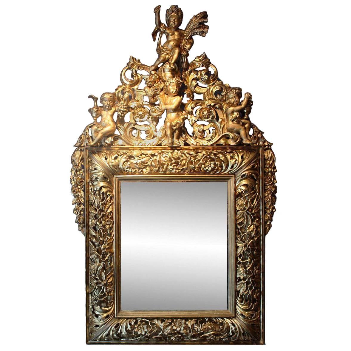 18th Century Italian Carved Open-Work Giltwood Mirror Depicting the Four Seasons For Sale