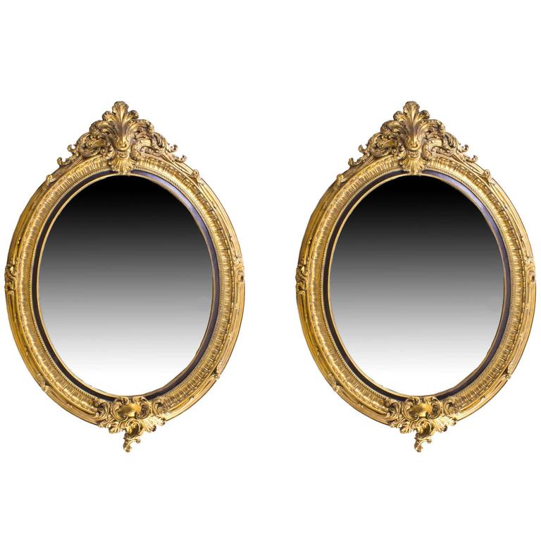 Pair of Beautiful Large Rococo Style Gilded Oval Mirrors For Sale at 1stdibs