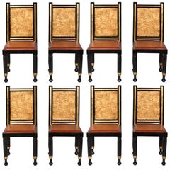 Set of Eight Gilt and Painted Egyptian Inspired Dining Chairs