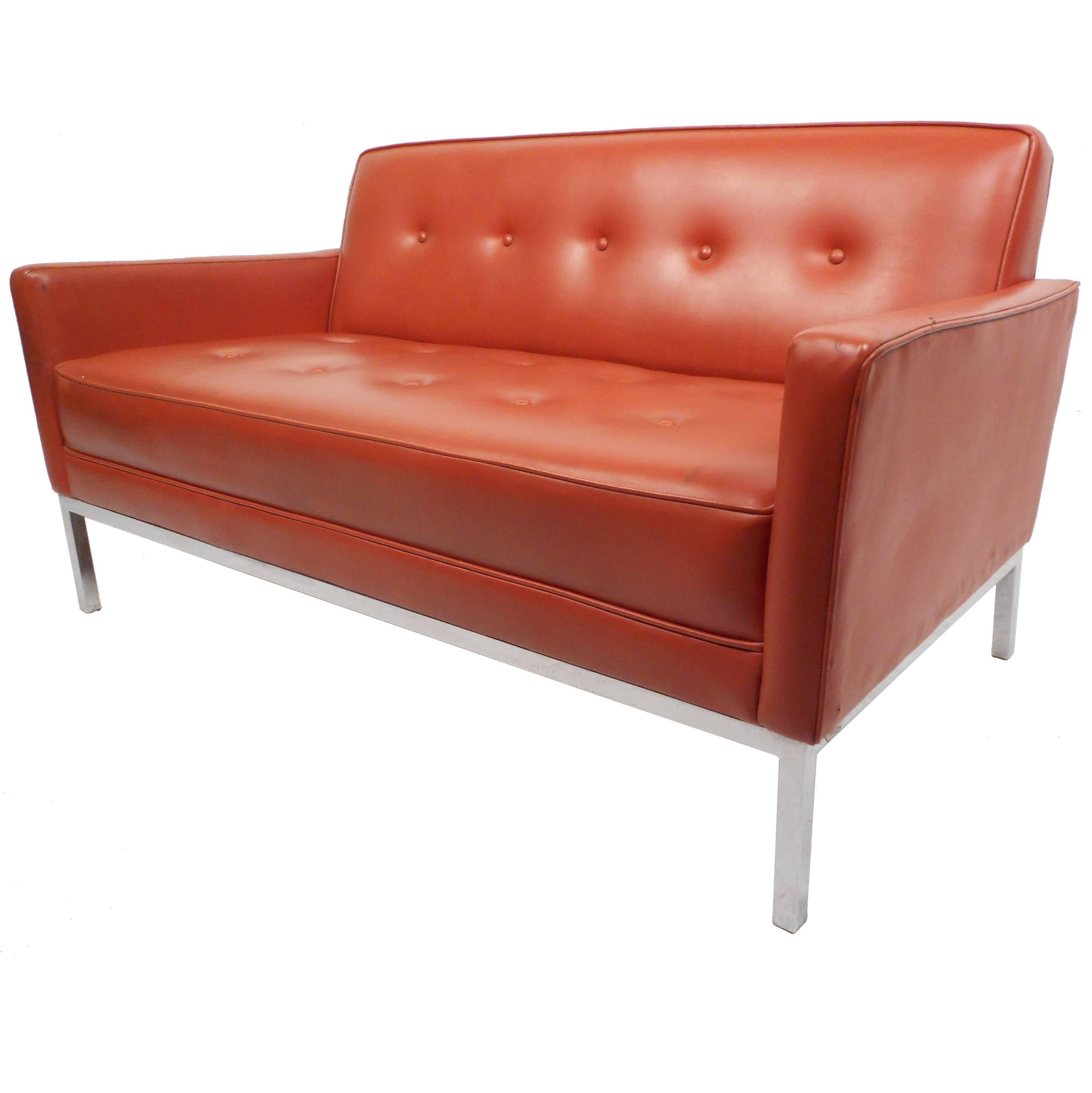 Mid-Century Orange Vinyl Loveseat with a Chrome Base