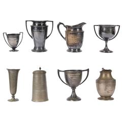 Group of Eight Antique Tennis Trophies