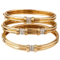 Set of Three 18-Karat Gold and Diamond Tiffany Bracelets