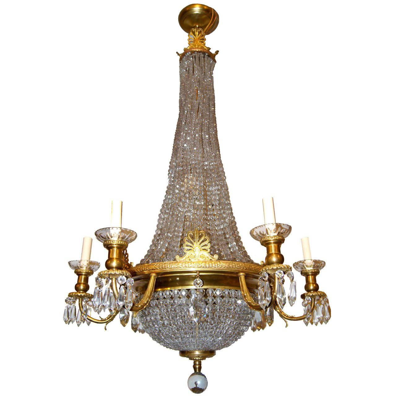 Lustre français en bronze doré et cristal