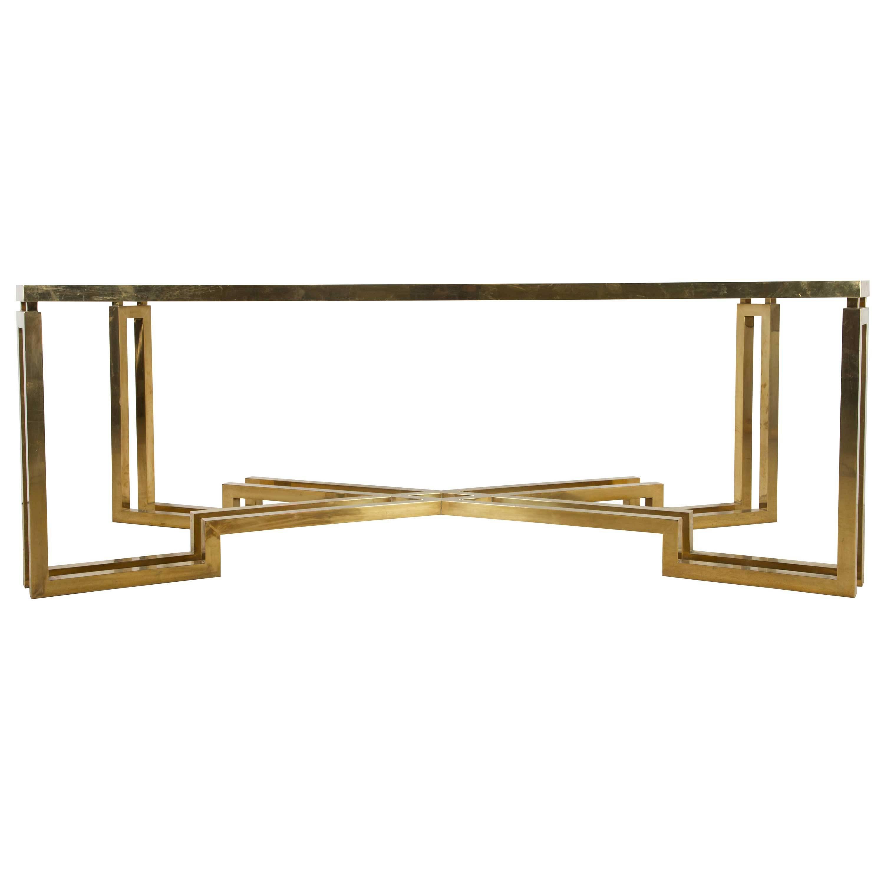A stunning 1960s Italian brass and glass dining table.