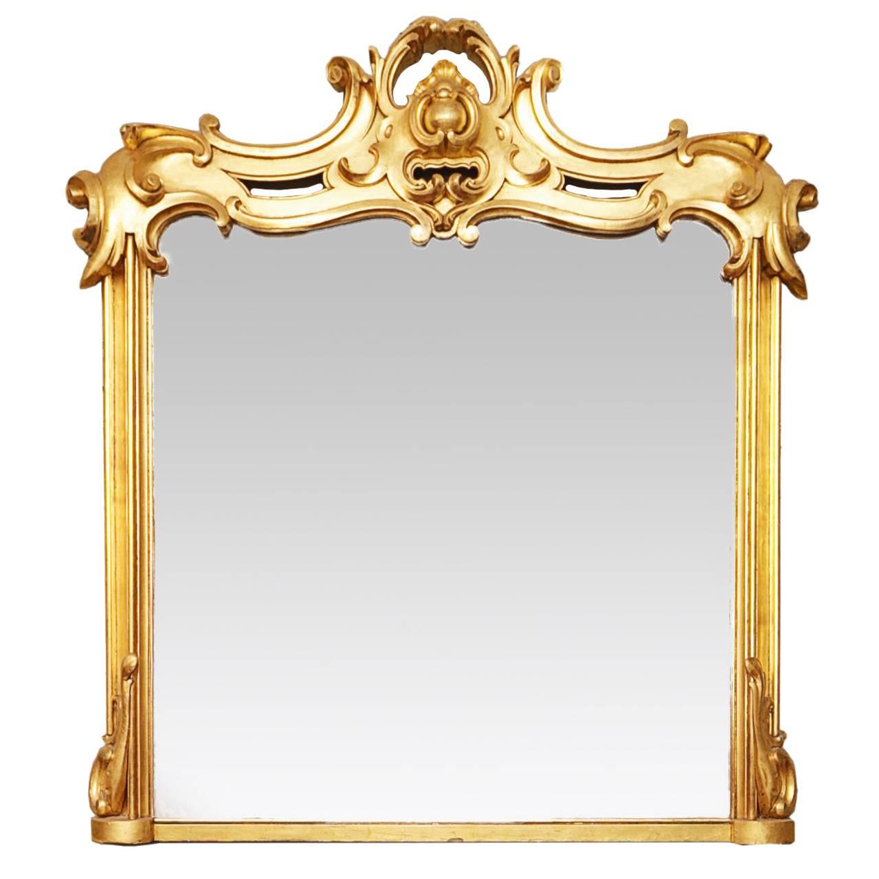 Miroir de trumeau en bois doré sculpté du 19ème siècle en vente