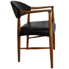 Kurt Olsen chair, fully reupholstered in black leather.
