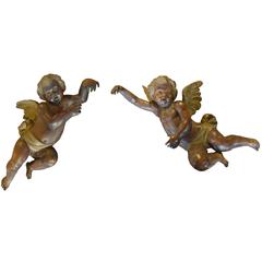 Pair of Carved Putti