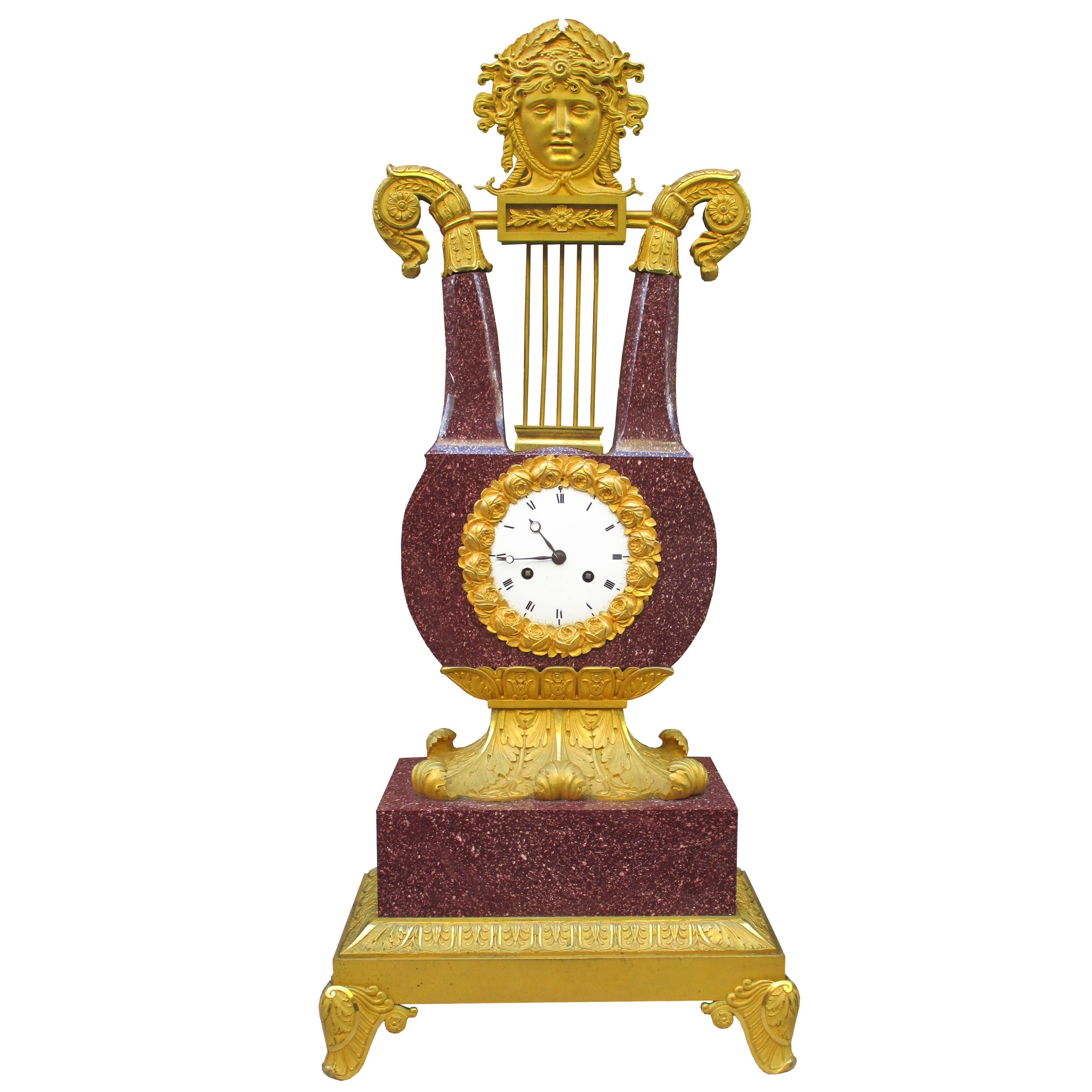 Très belle horloge lyre impériale Charles X en porphyre en vente