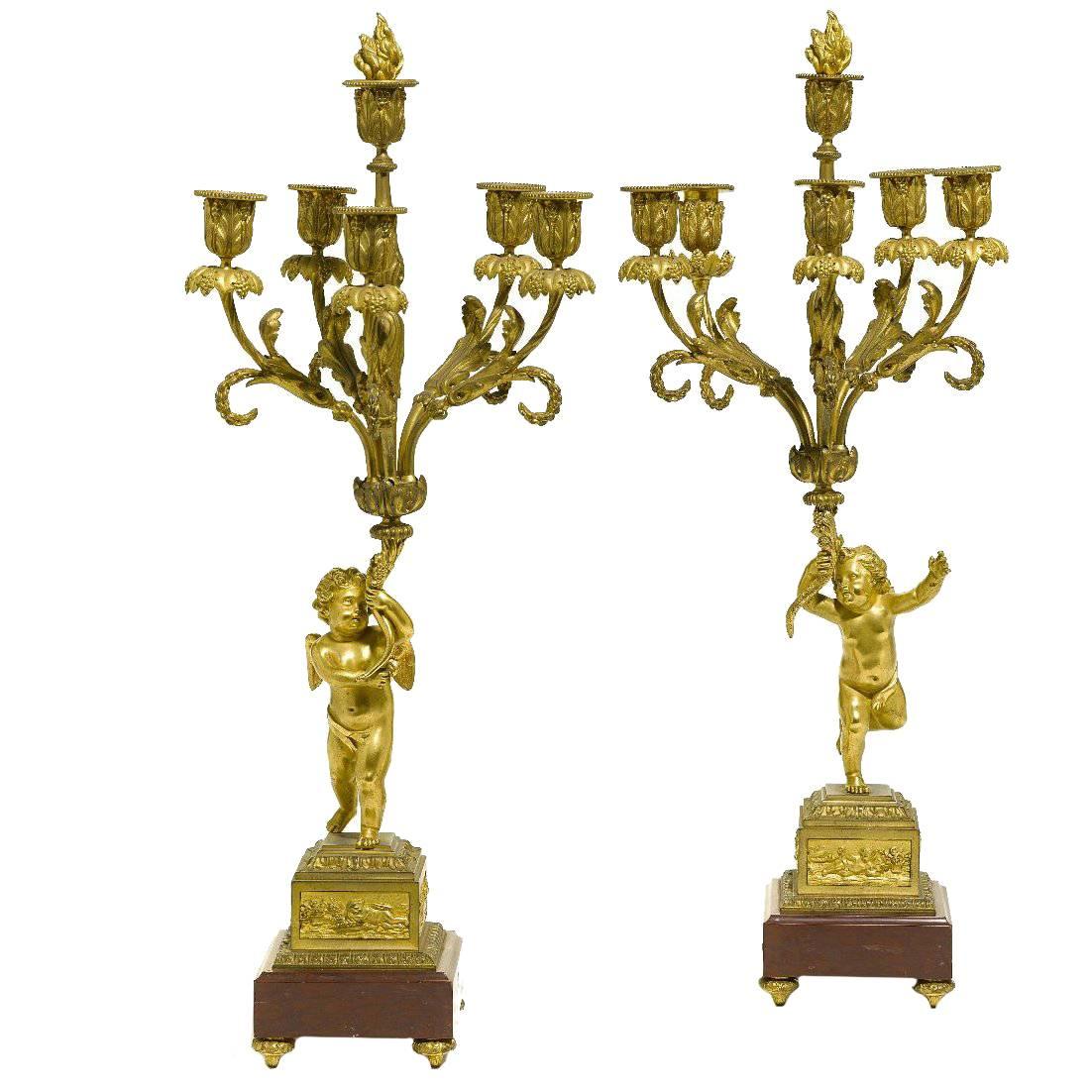 Pair of French 19th Century Louis XV Style Gilt Bronze Candelabra with Cherubs