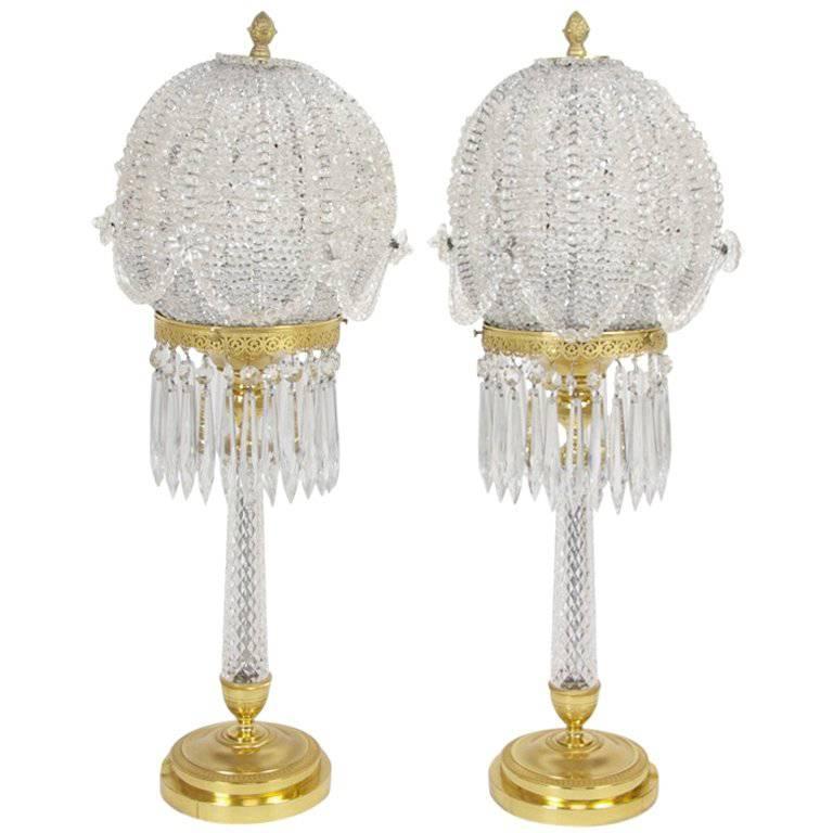 Pair of Gilt Bronze and Crystal Lamps by Jansen For Sale