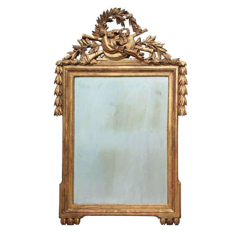 Louis XVI carved and gilded mirror, ca. 1780