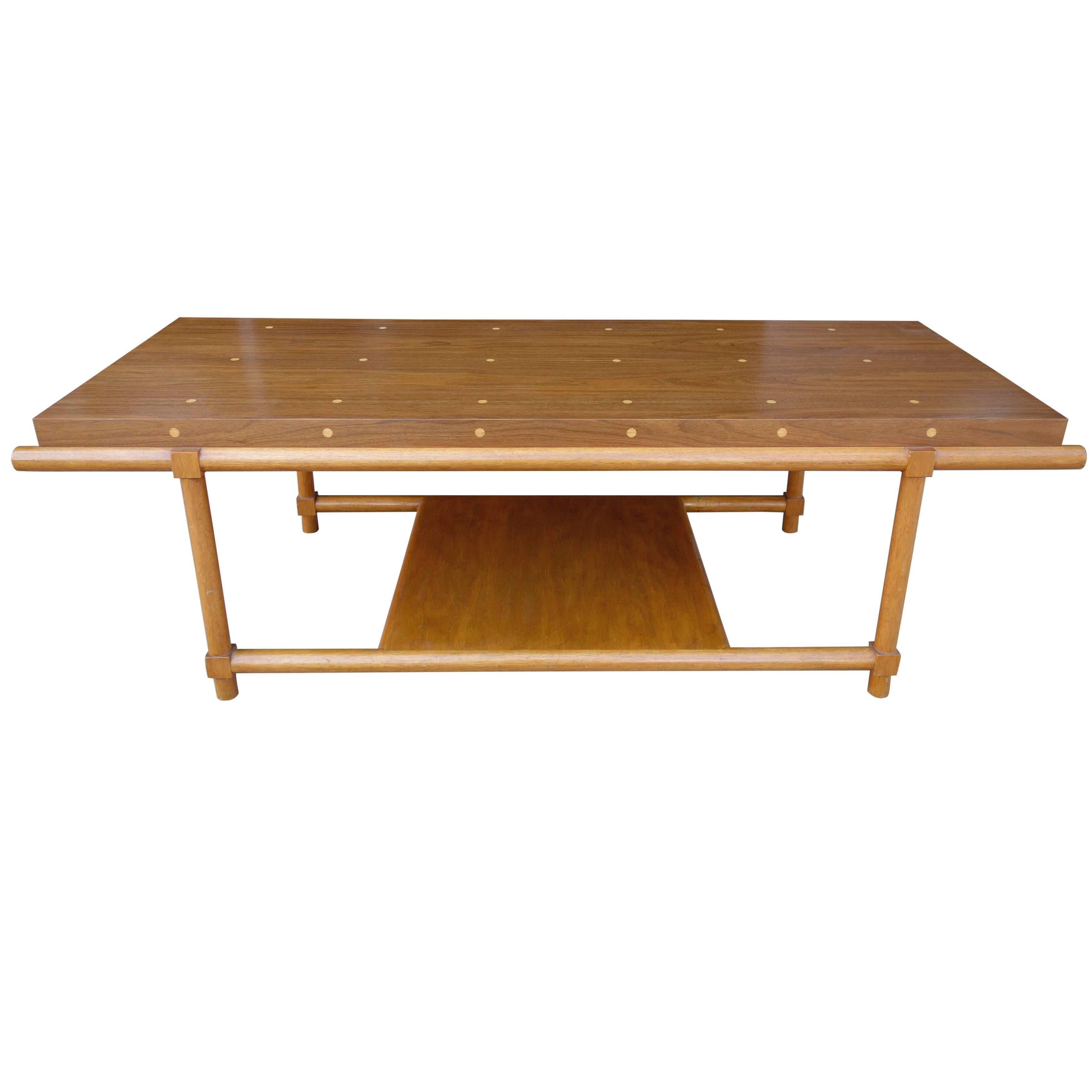 Unique and rare Mid-Century Tommi Parzinger originals polka dot coffee or low table. Walnut top with wood inlay. 

 