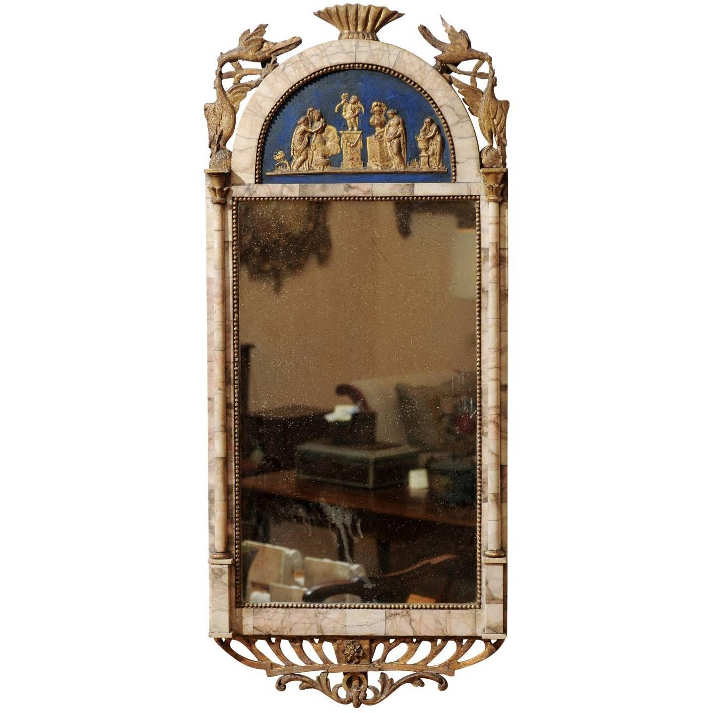 Miroir espagnol du début du XIXe siècle monté sur marbre et doré à la feuille