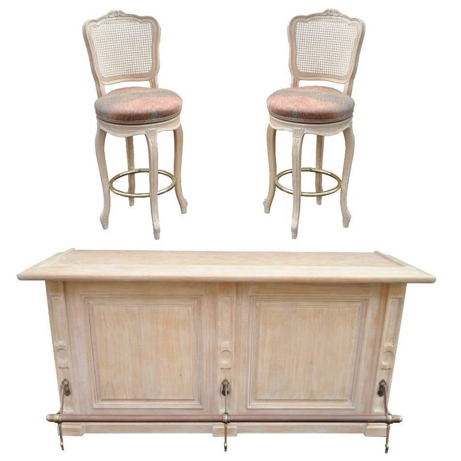 French Louis XV Style Bar Counter and Pair of Cane Swivel Bar Stool Chairs
